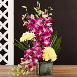 Yellow Carnations & Orchids In Vase