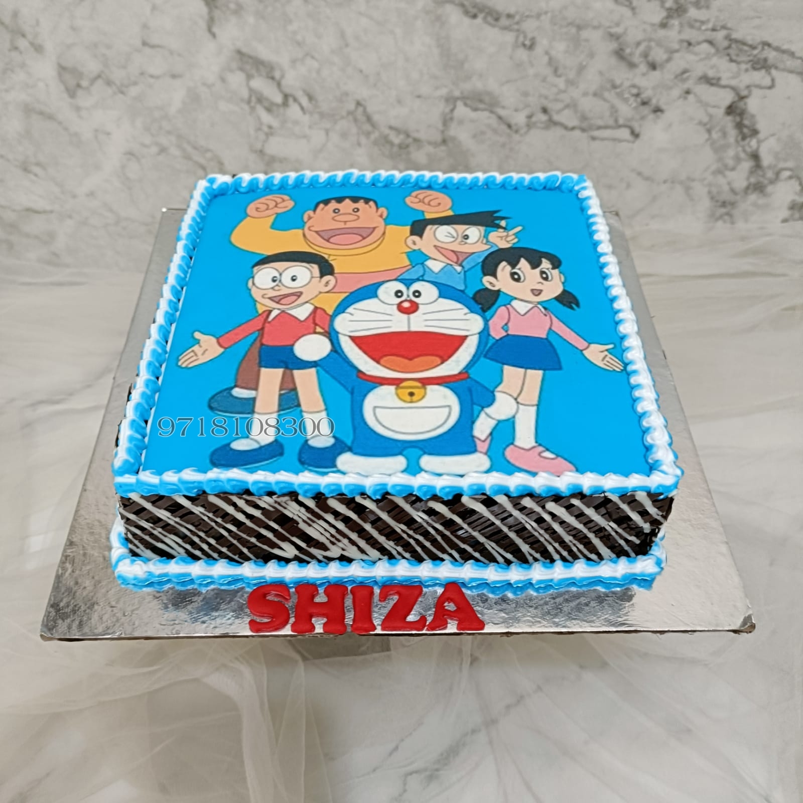 Doraemon Cake with 1kg of strawberry... - House of Bakeology | Facebook